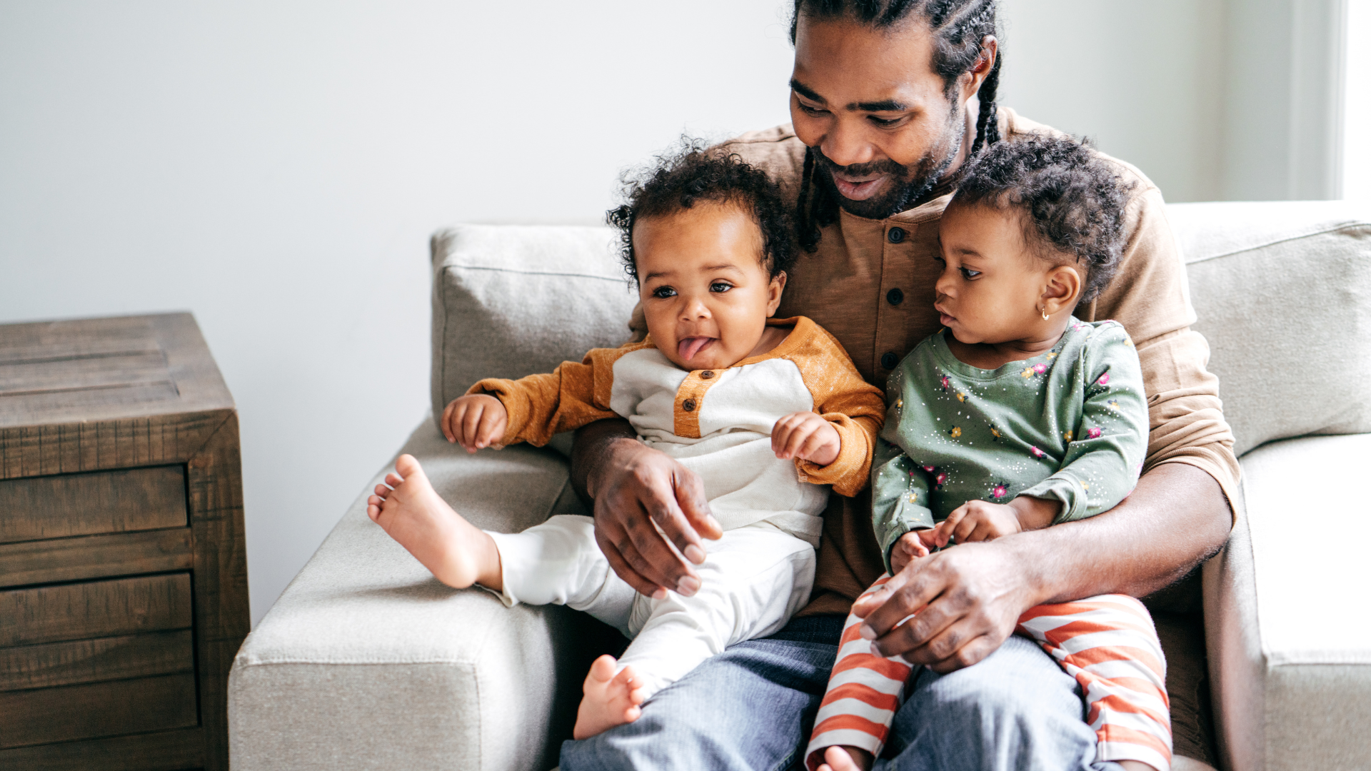 A wooden table topped with scales of justice and a judge 's gavel.