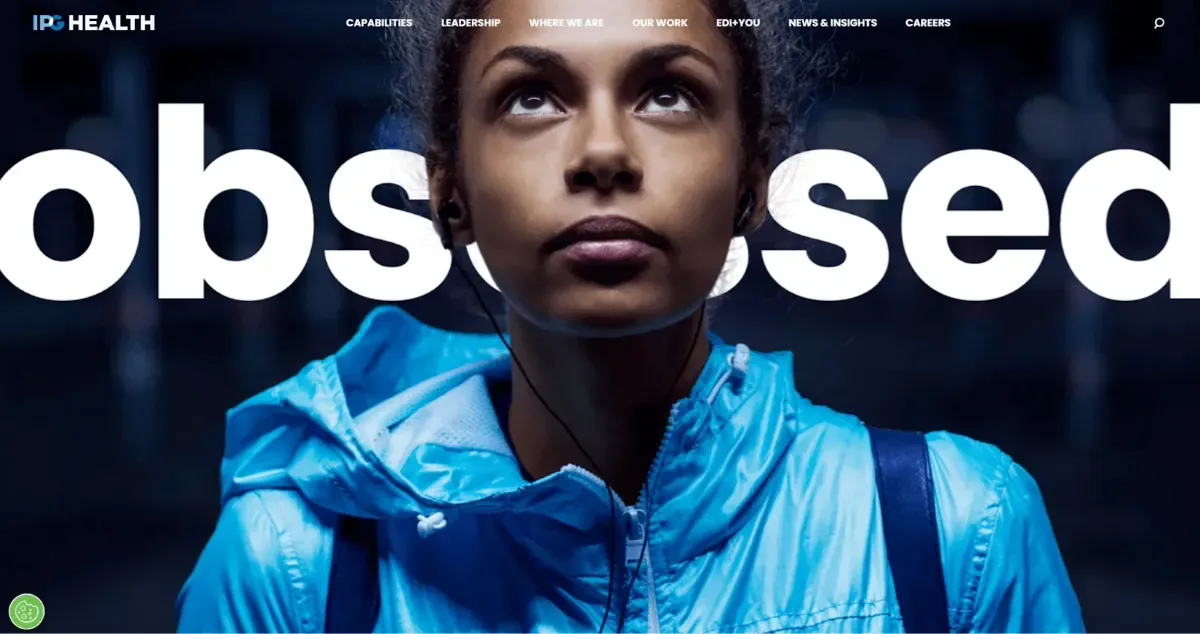 Website home page with a young woman standing in front of the word obsessed