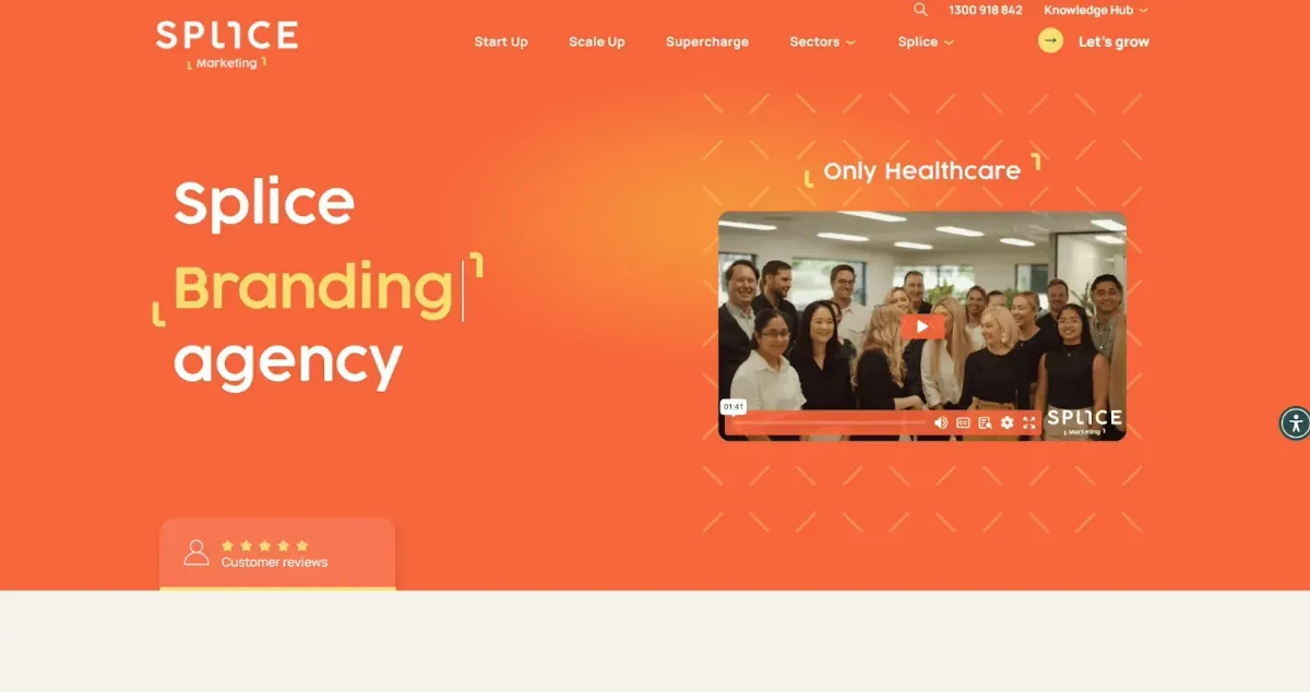 Website home page with copy and an image of a video thumbnail of people gathered in an office