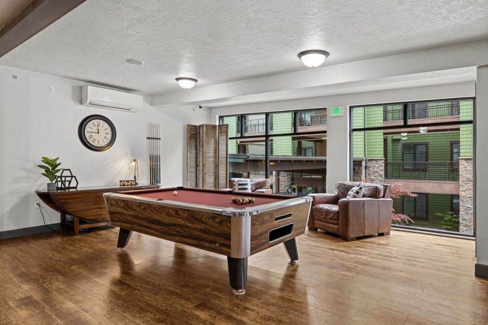 Clubhouse featuring pool table at Copperline at Point Ruston in Tacoma, WA.