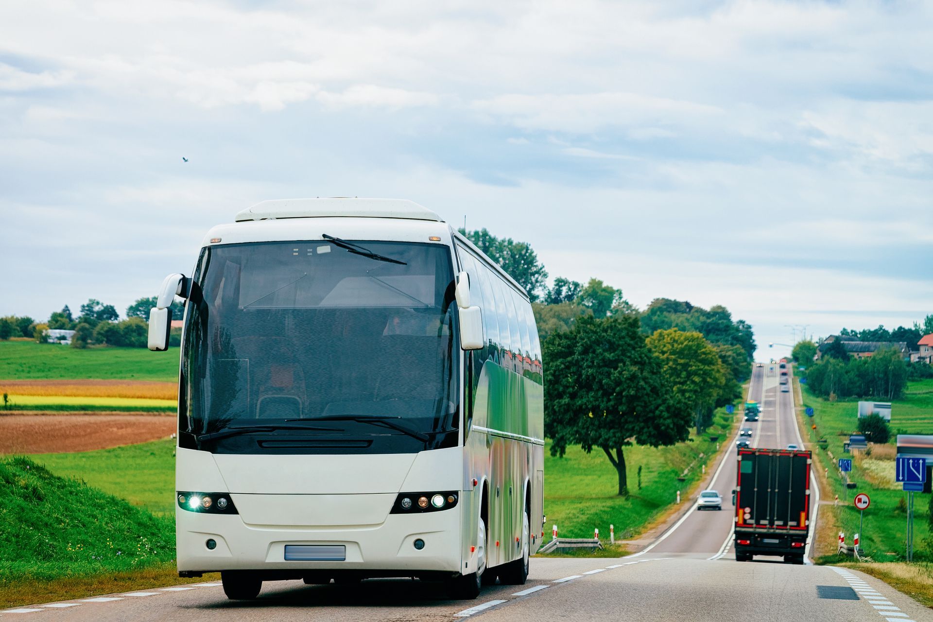 White Tourist bus on road. White Tourist bus on road.
