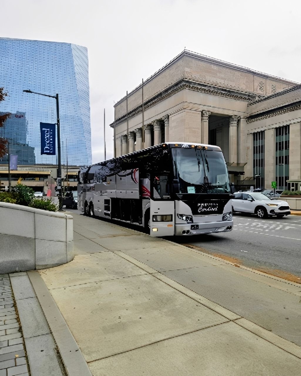 The bus is parked for rental service. The bus is parked for rental service.