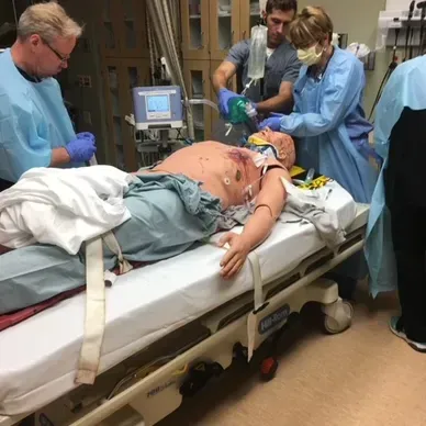 A person is holding a pineapple in a bag in a grocery store.