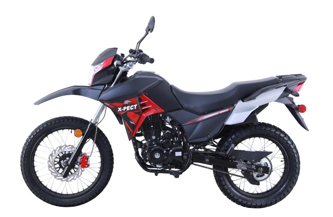 A red and black motorcycle with a disc brake on a white background.