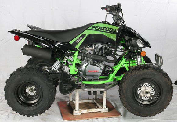 A green and black atv with the word centoba on the side