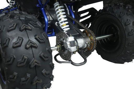 A close up of the rear wheel of a four wheeler.