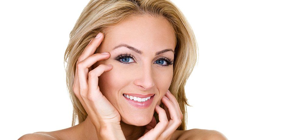 smiling woman in dentist office