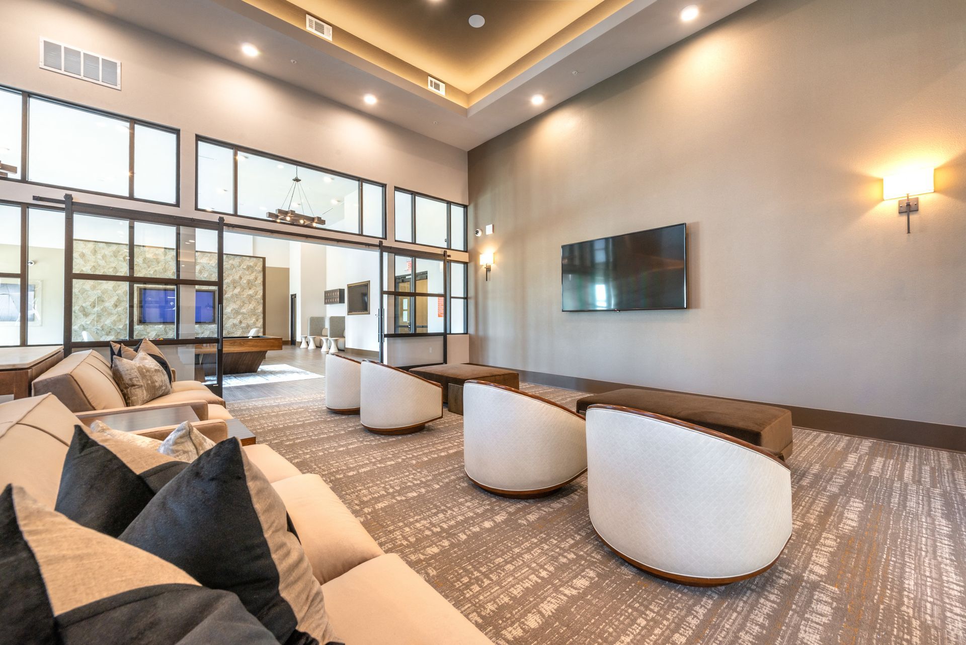 The clubhouse is filled with furniture and a flat-screen TV.