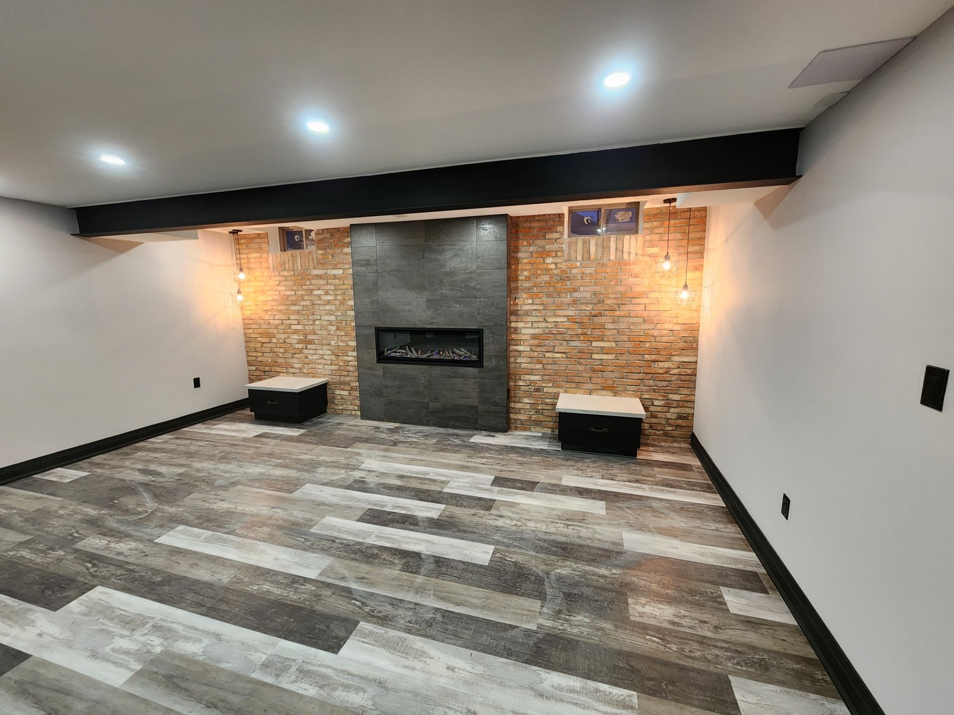 There is a fireplace in the middle of the room.