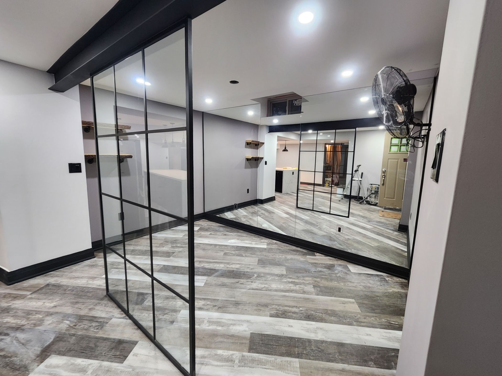 There is a large mirror in the middle of the room.