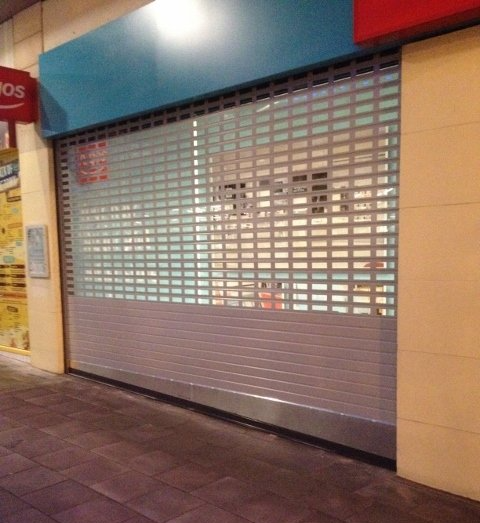 A store with a sign that says ' os ' on it