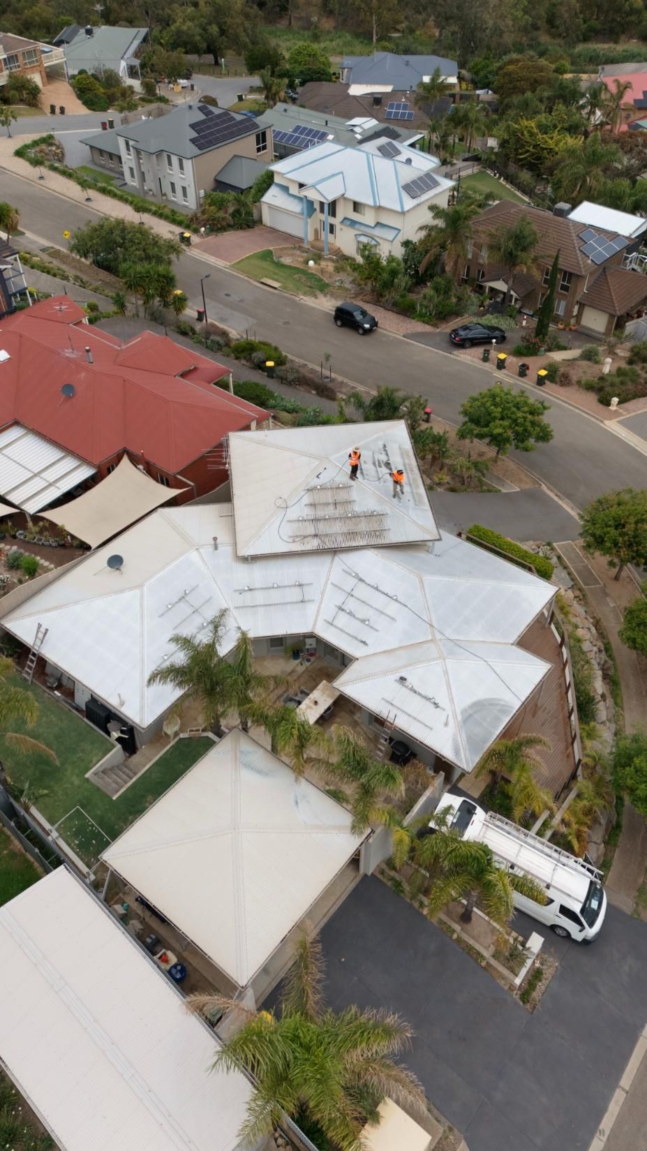 A roof being cleaned in Adelaide