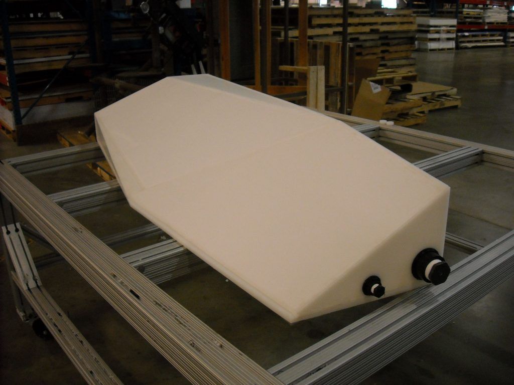 A large white object is sitting on top of a metal shelf