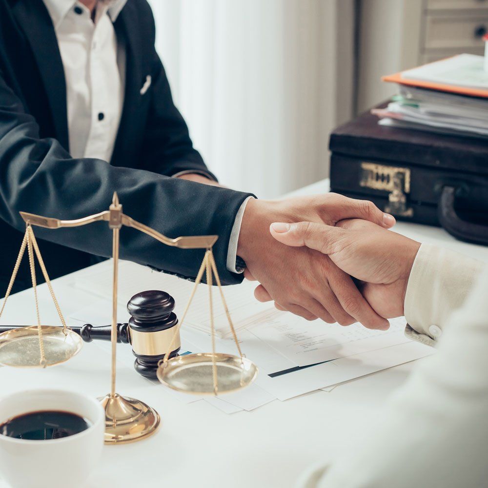 Lawyer and Client Shake Hands — Elizabeth, NJ — Eisdorfer, Eisdorfer, Eisdorfer