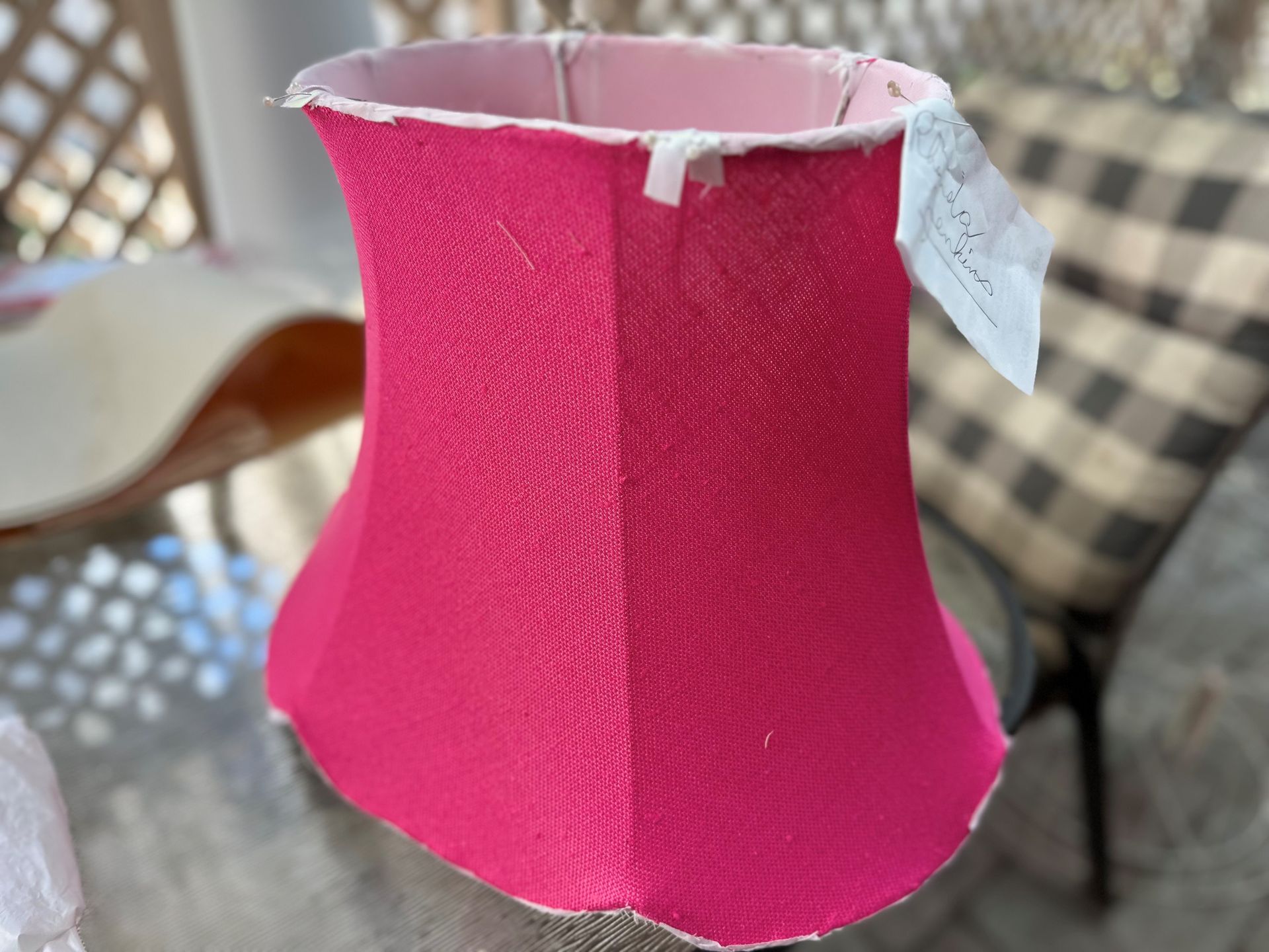 A blue and white lamp with a white shade