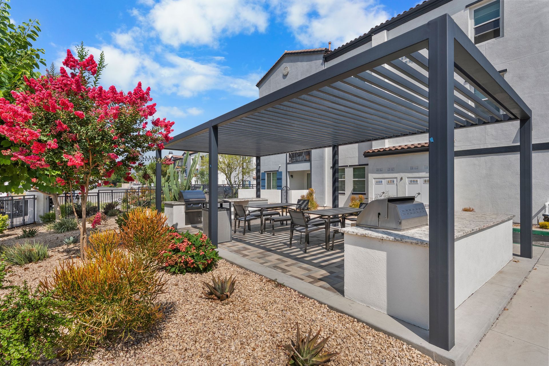 Cabana covering BBQ grill and picnic table
