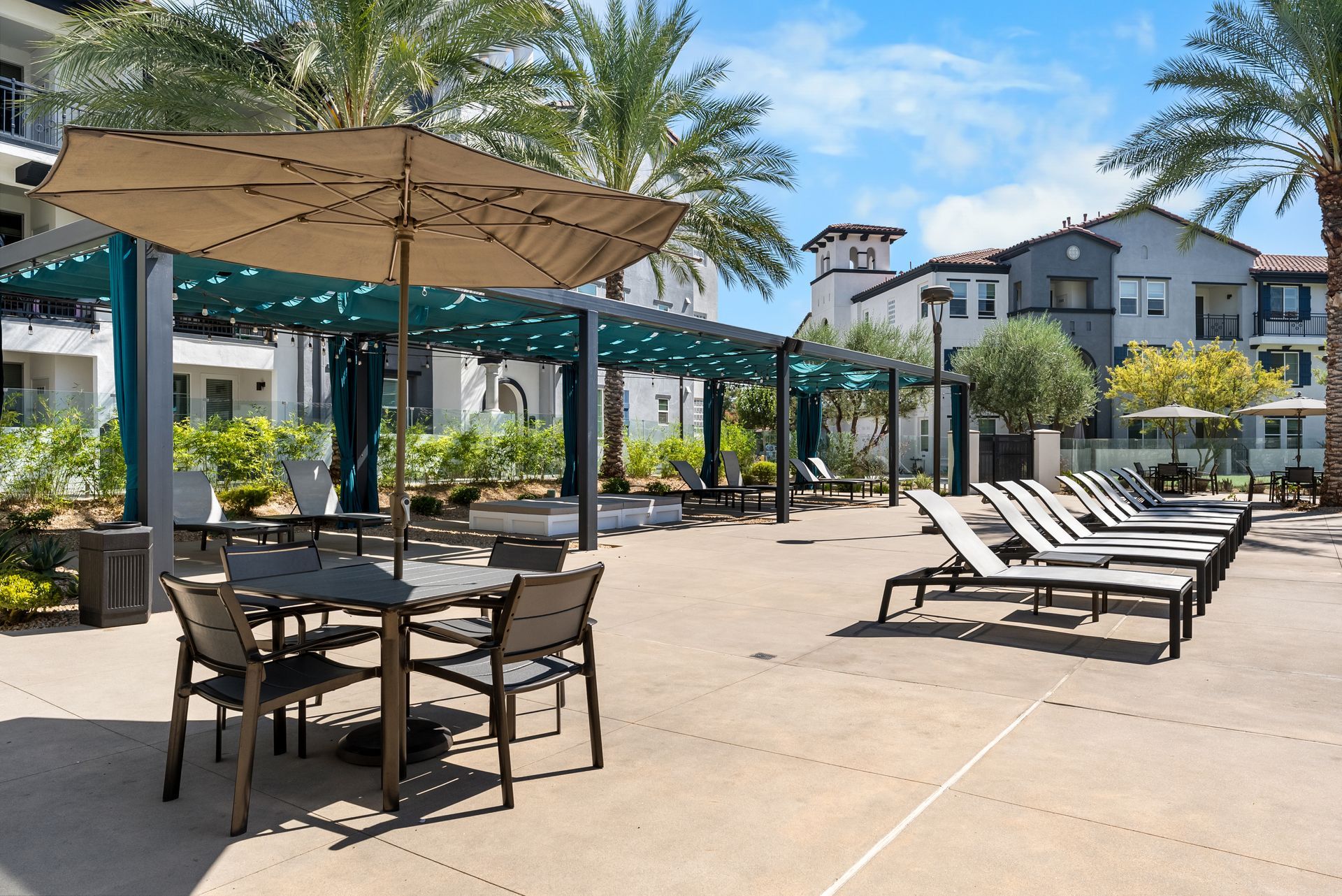 Cabana and lounge chairs and sun umbrella