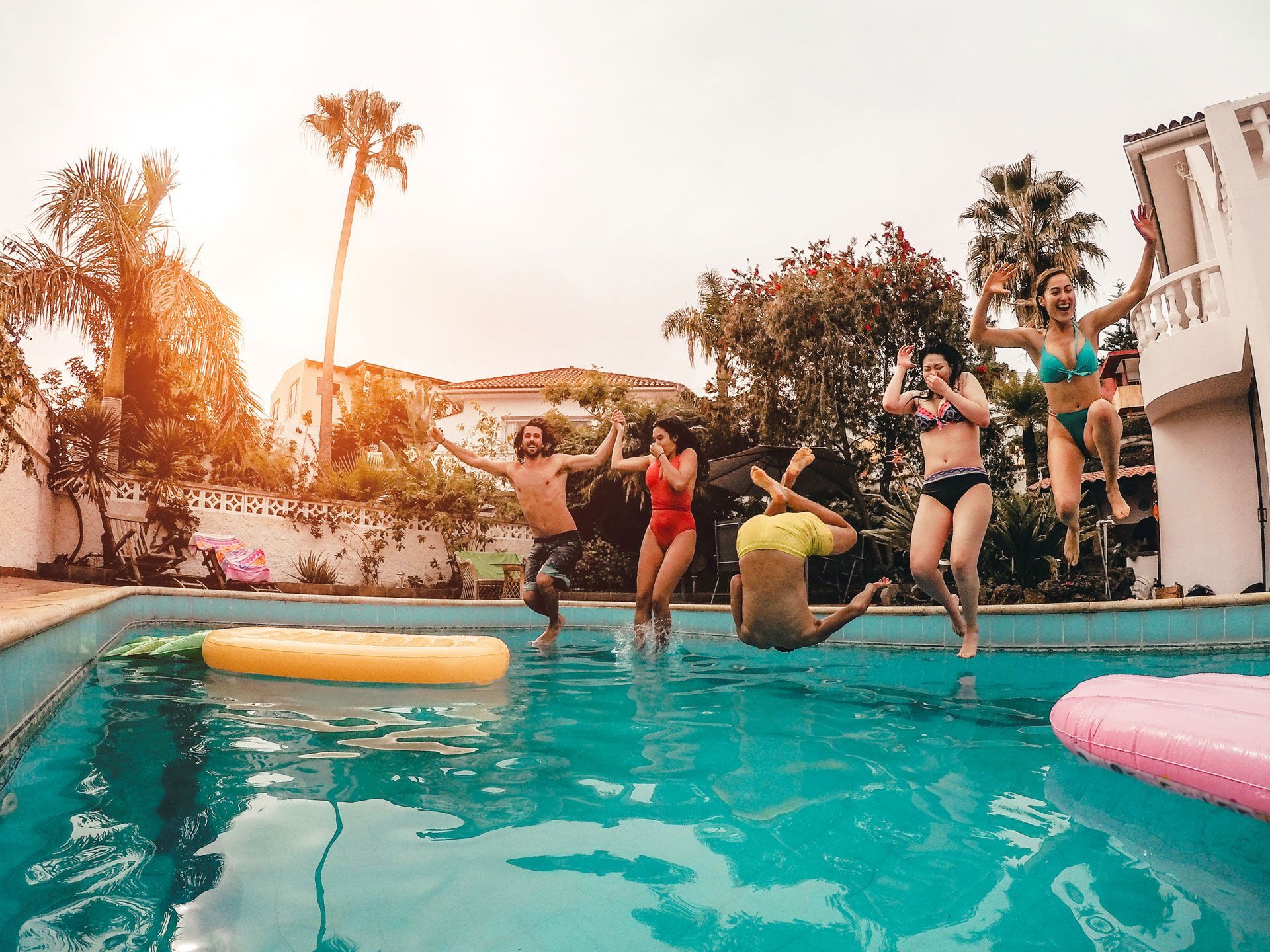Happy People Jumping On Pool — Townsville, QLD — Pinnacle Pools NQ