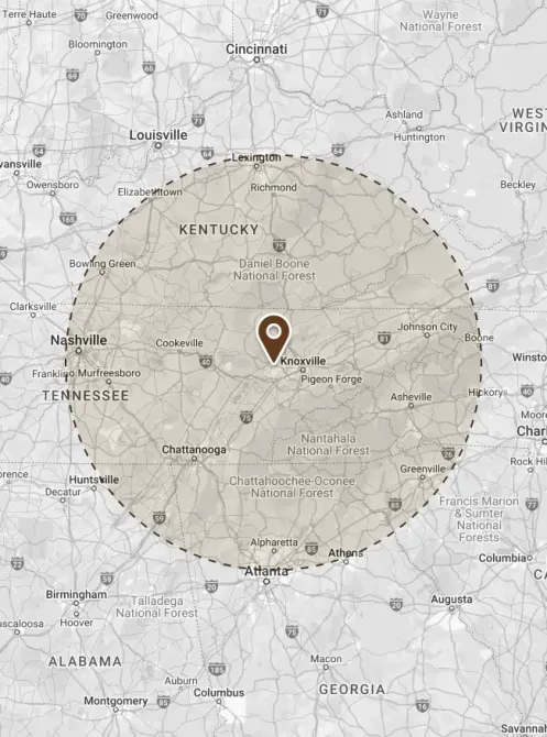 A black and white map of kentucky with a circle around it.
