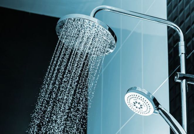 A Close Up Of A Shower Head With Water Coming Out Of It — Coastal Gasfitting & Plumbing In Mount ST John, QLD