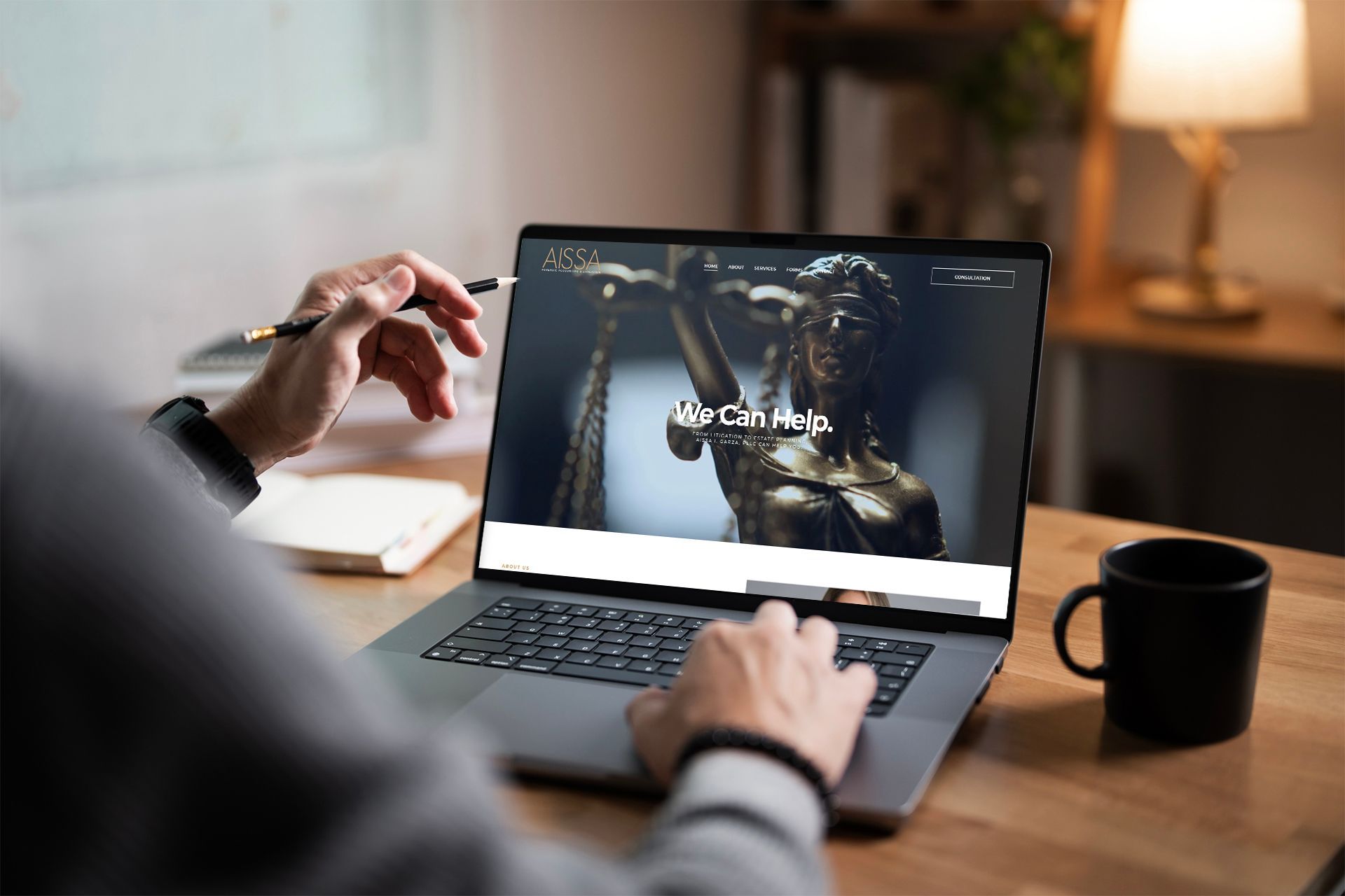 A laptop computer is sitting on a table with a woman on the screen.