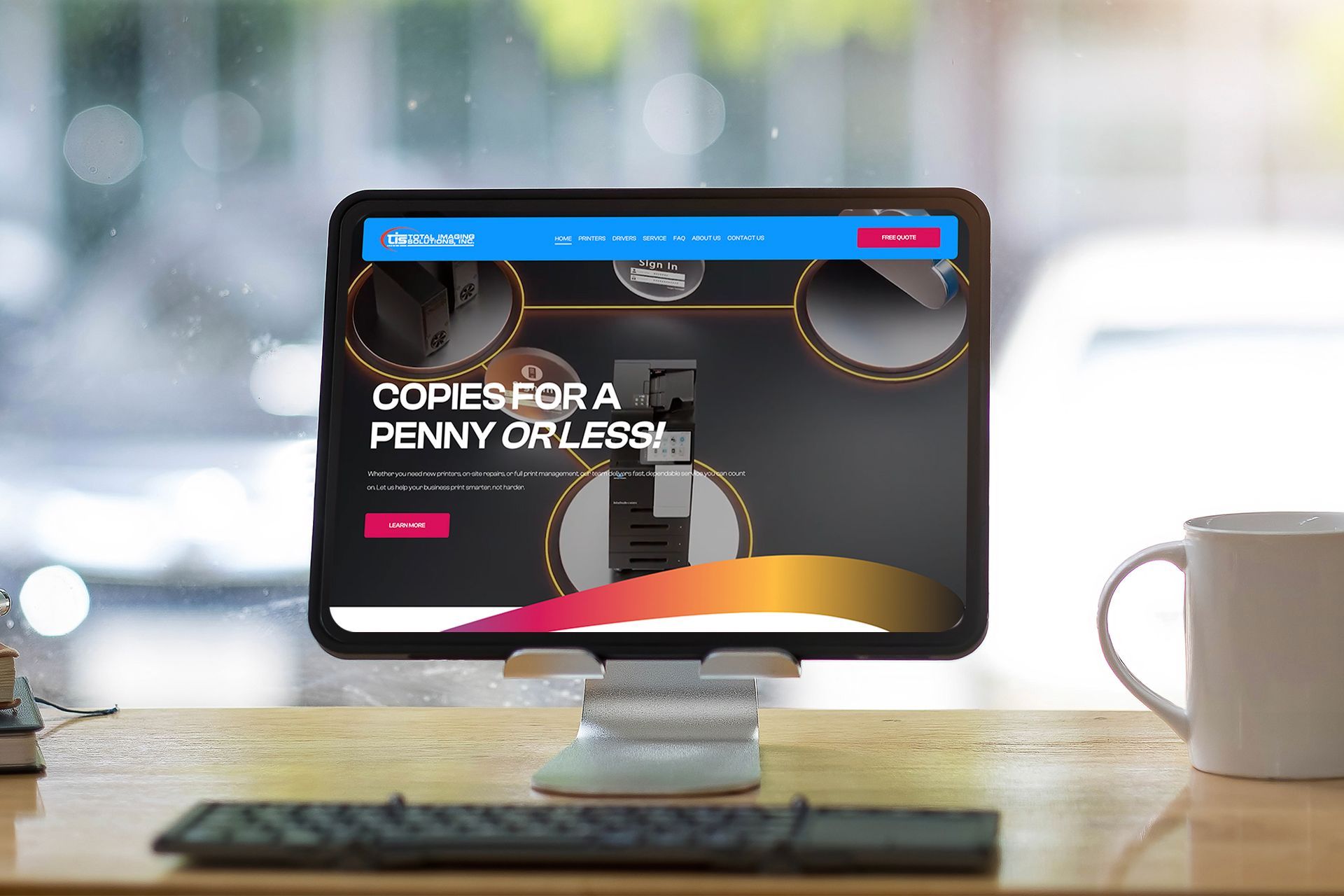 A laptop computer is sitting on a table with a woman on the screen.