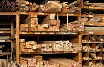 Building Materials — Planks of wood on shelves in San Leandro, CA