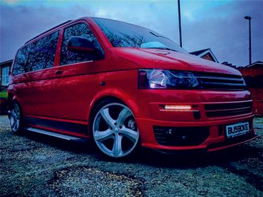 red Volkswagen camper van