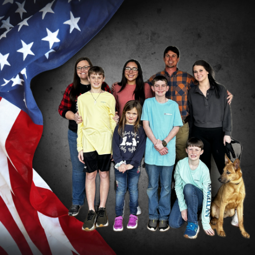 The Joiner family of J& S Maintenance posing in front of an american flag.