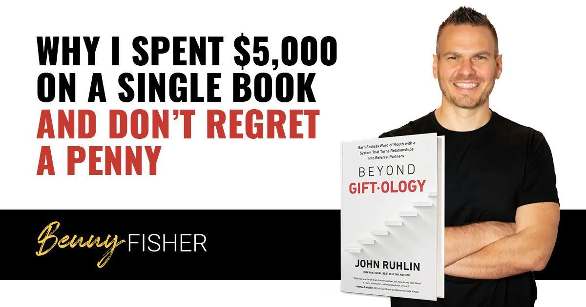 A man is holding a book titled why i spent $ 5,000 on a single book and don t regret a penny