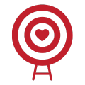 Red target with a heart at its center, on a stand.