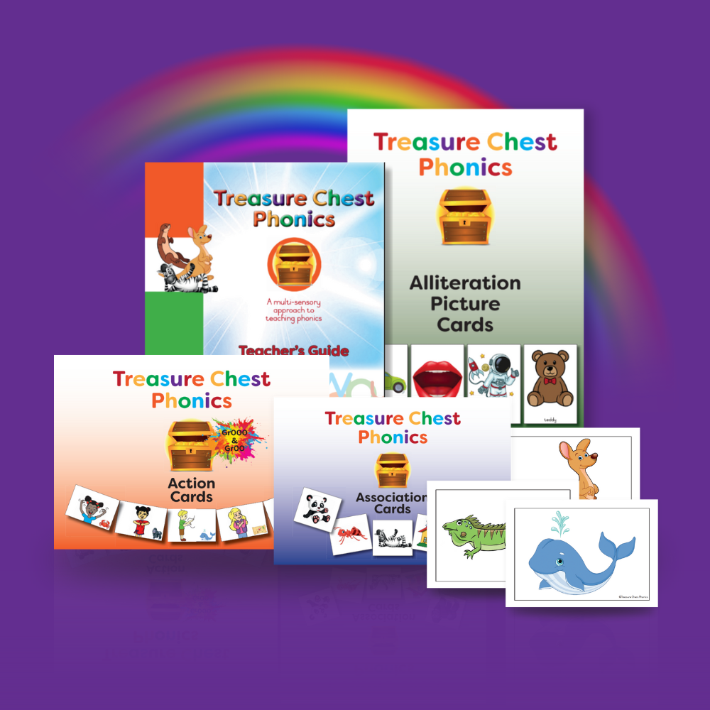 A phonics learning set with cards, a teacher's guide, and a rainbow background.