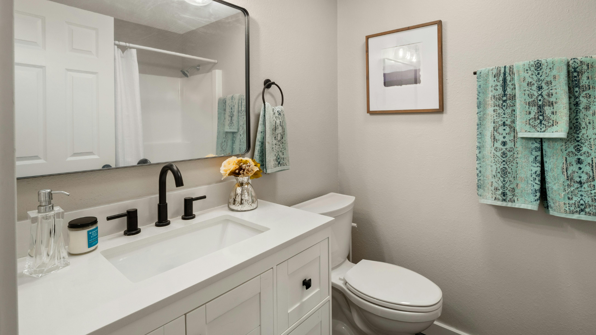 A close-up of a sink pipe in a kitchen