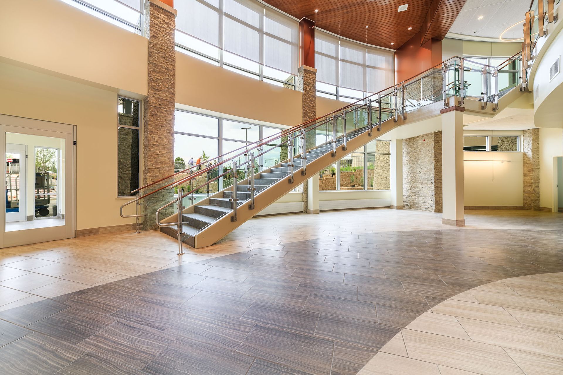 a large building with a lot of windows installed by Sun Glass Montrose