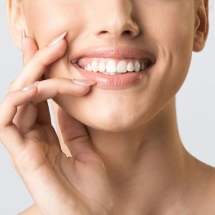 Young woman smiling with beautiful teeth
