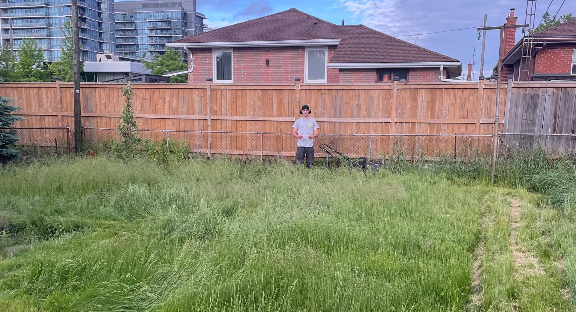Overgrown lawn cleanup about to be completed by MMC Lawn Care