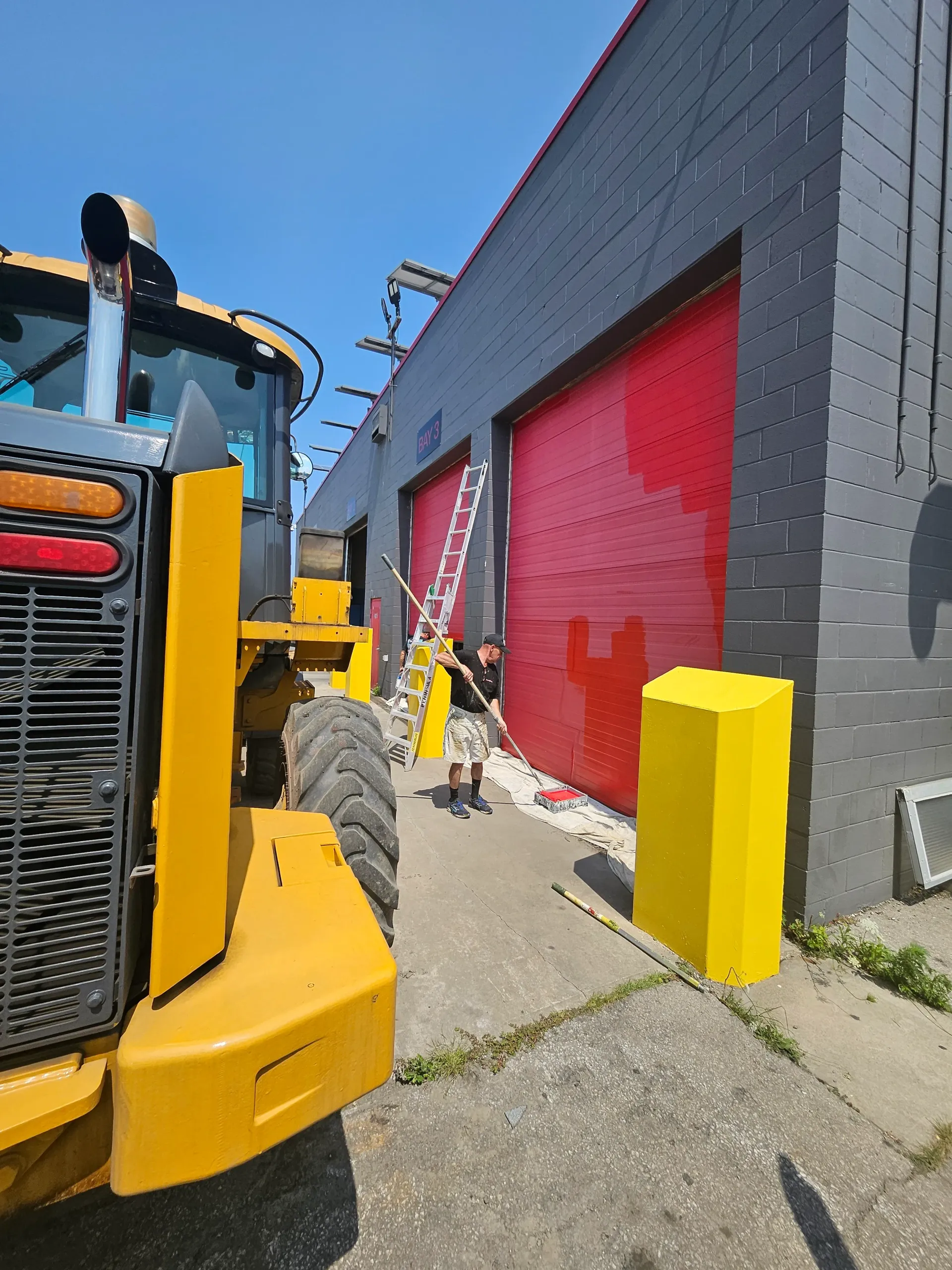 Hamilton’s Trusted Commercial Painters; Image of commercial business getting painted by Peninsula Painting 