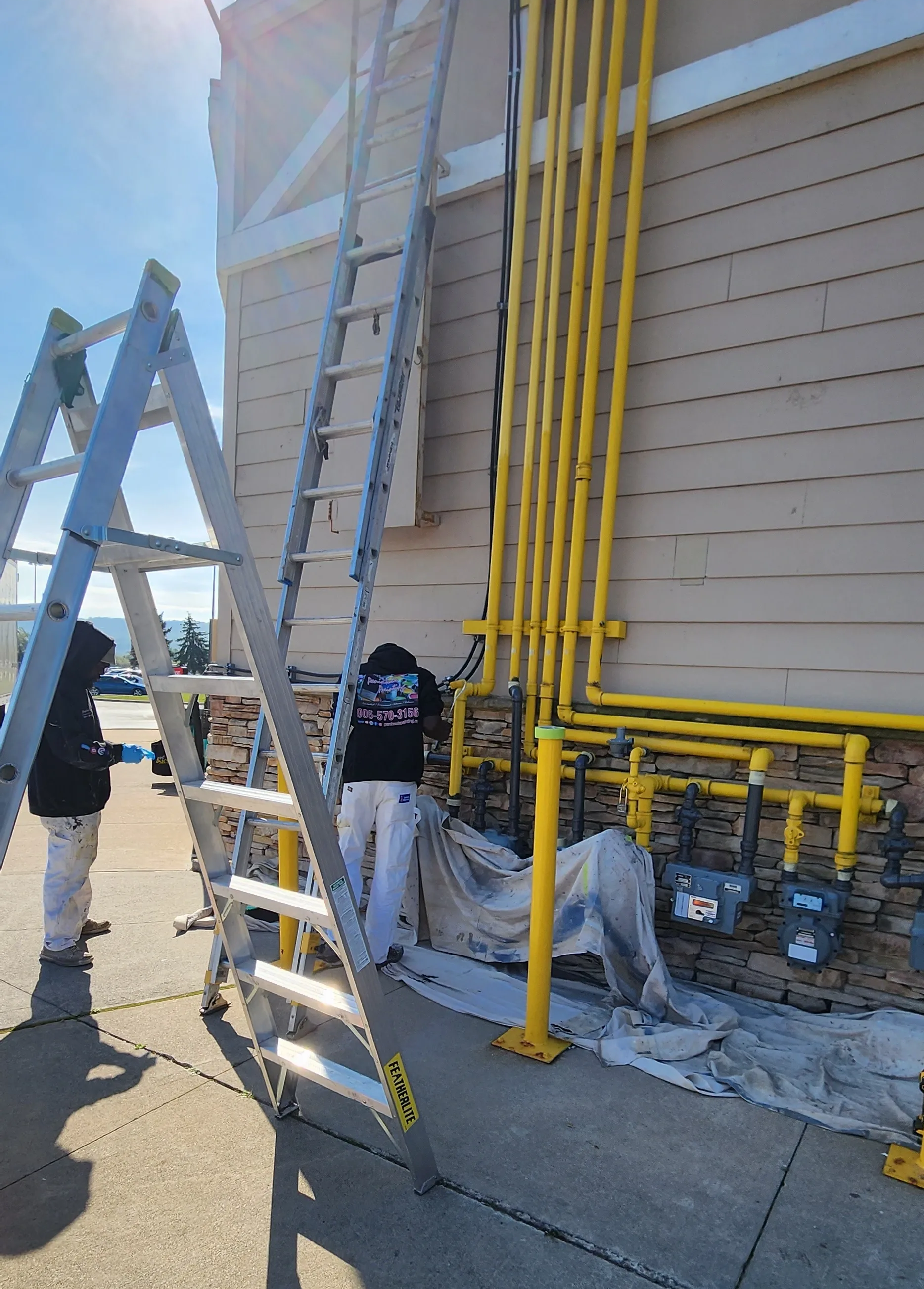 Hamilton’s Trusted Commercial Painters; Image of commercial business getting painted by Peninsula Painting 