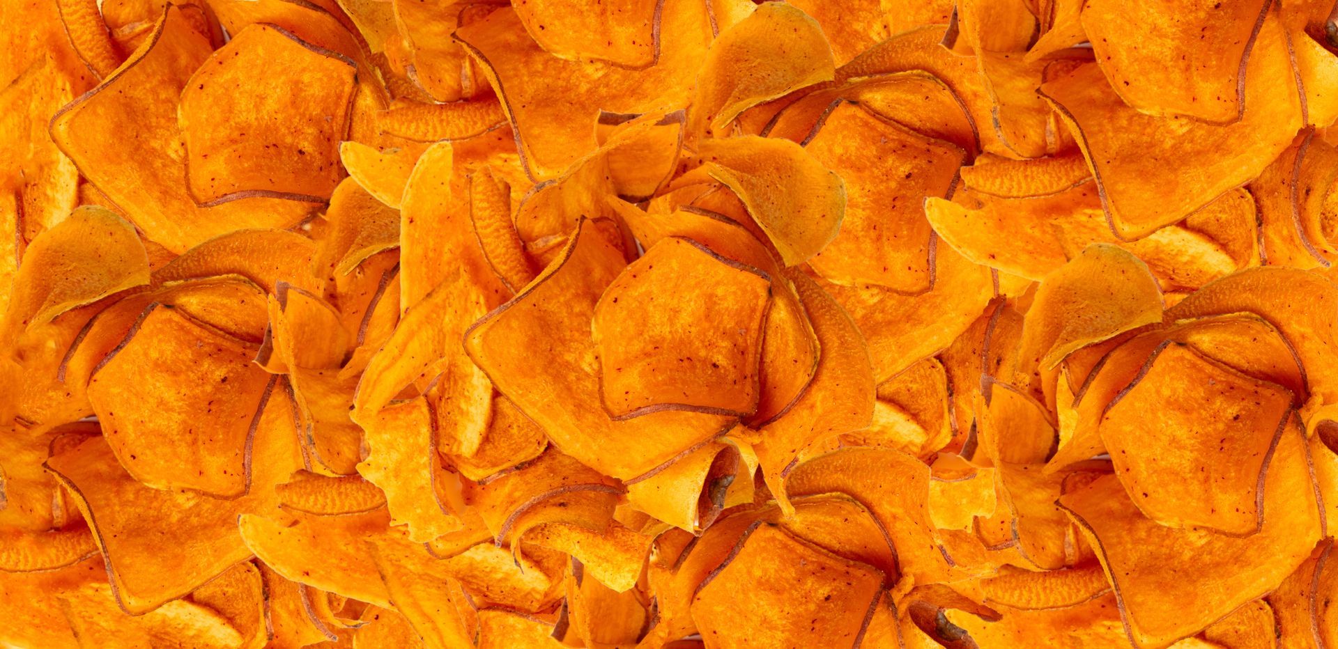 Pile of golden-brown, crispy chips