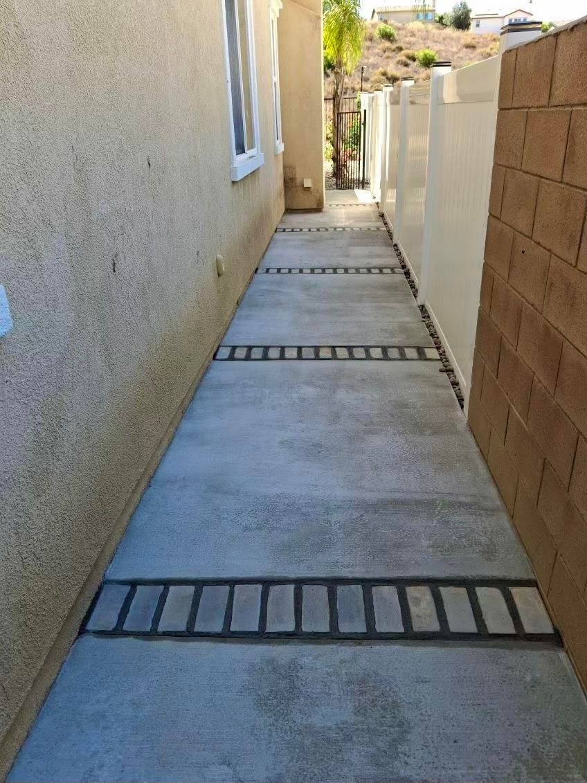 Property Side Walkway Concrete Design with Brick Accents in Hemet, CA