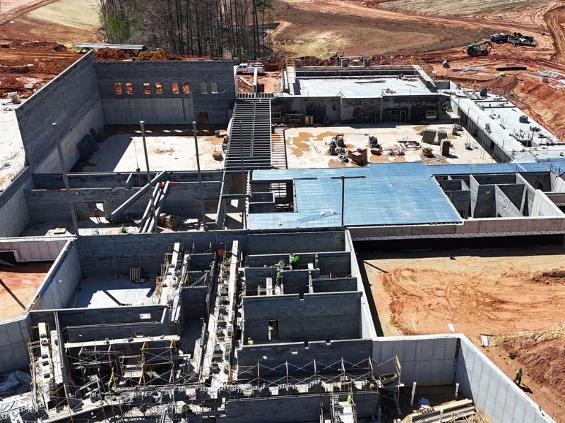 An aerial view of a large building under construction