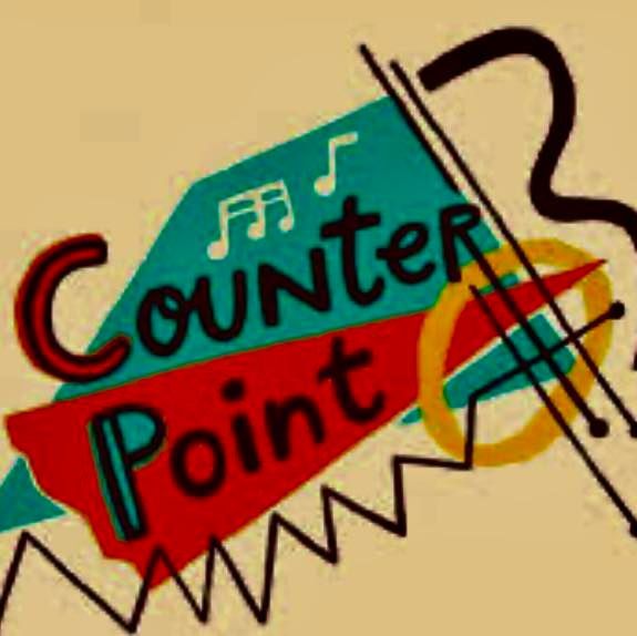 A man wearing a hat that says dixie is playing a guitar