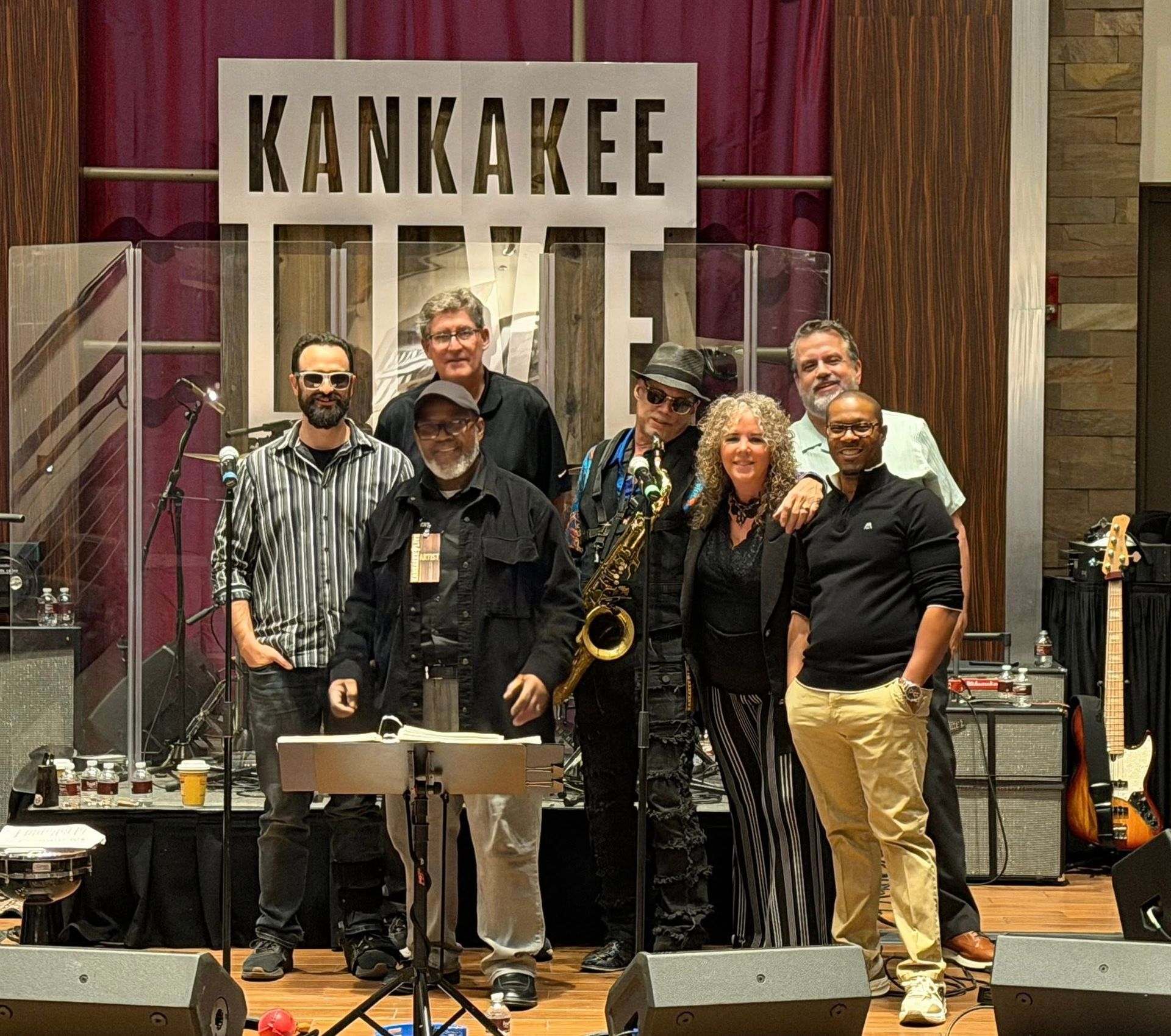 A large white building with a green awning over the entrance
