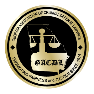 The logo for the georgia association of criminal defense lawyers