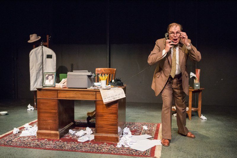Bernie in his messy office  and looking very excited