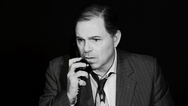 Bernie listening to a phone conversation