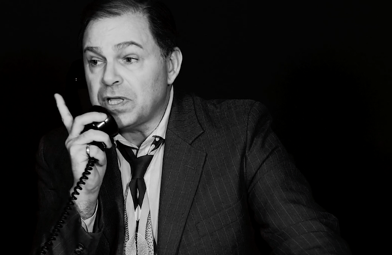 Bernie reacting to the phone conversation in this black and white picture