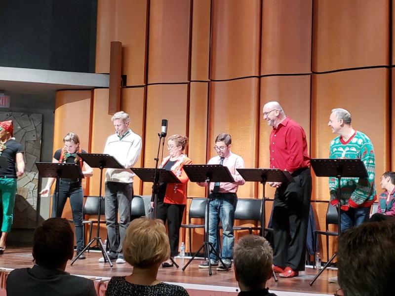 7 actors reacting  happily during a scene