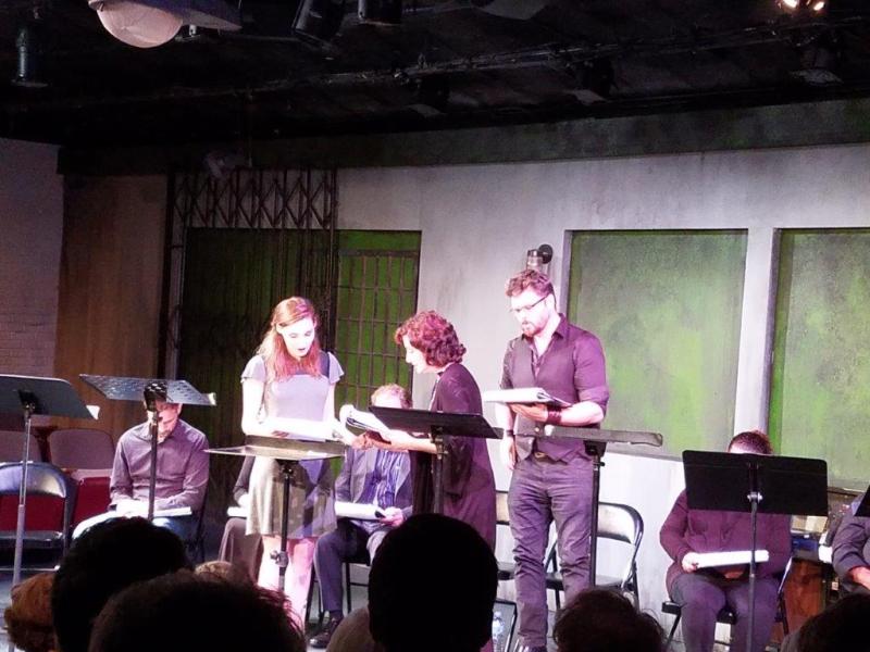 3 actors during a scene while audience watches.