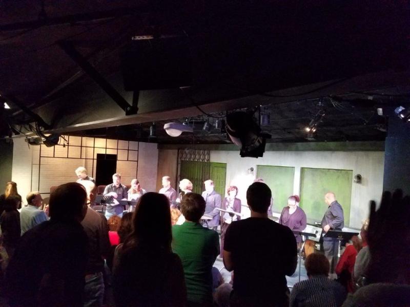Audience applauding actors after play reading of The Little Foxes.